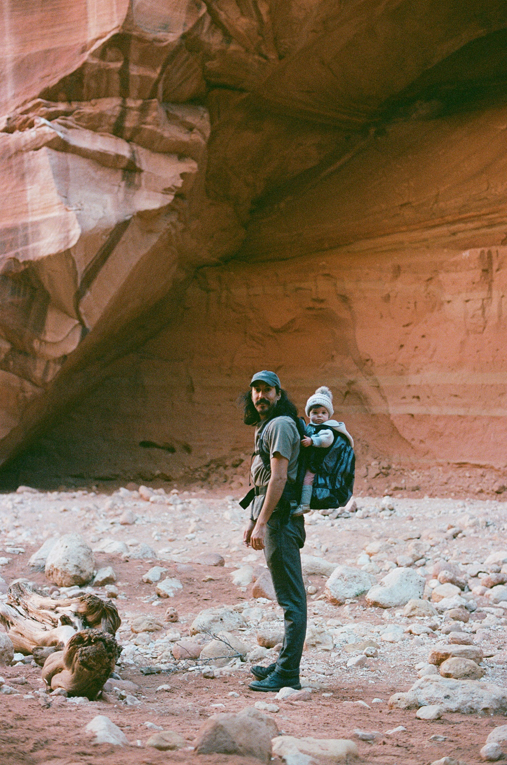 Family travel inspiration for a father and daughter in Kanab Utah in a slot canyon.